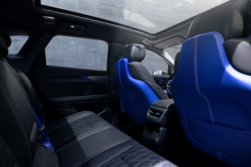 Back Seat View of the 2026 OPTIQ-V Blue Front Seats, Sun Roof, and Interior | Baldwin Cadillac in POPLAR BLUFF MO
